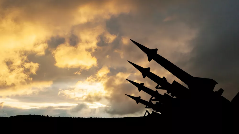 The missiles are aimed to the sky at sunset. Nuclear bomb, chemical weapons, missile defense, a system of salvo fire.