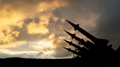 The missiles are aimed to the sky at sunset. Nuclear bomb, chemical weapons, missile defense, a system of salvo fire.