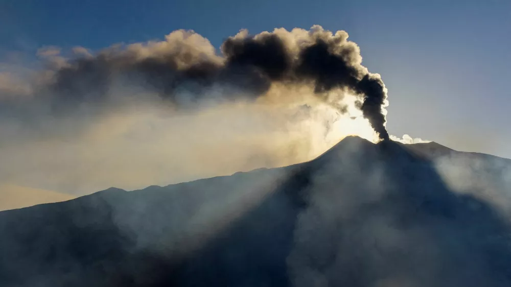 A drone view shows volcanic fumes rising during an eruption at Mount Etna in Sicily, Italy, August 11, 2026. Giuseppe Di Stefano/Etna Walk/via REUTERS ATTENTION EDITORS - THIS IMAGE WAS PROVIDED BY A THIRD PARTY.