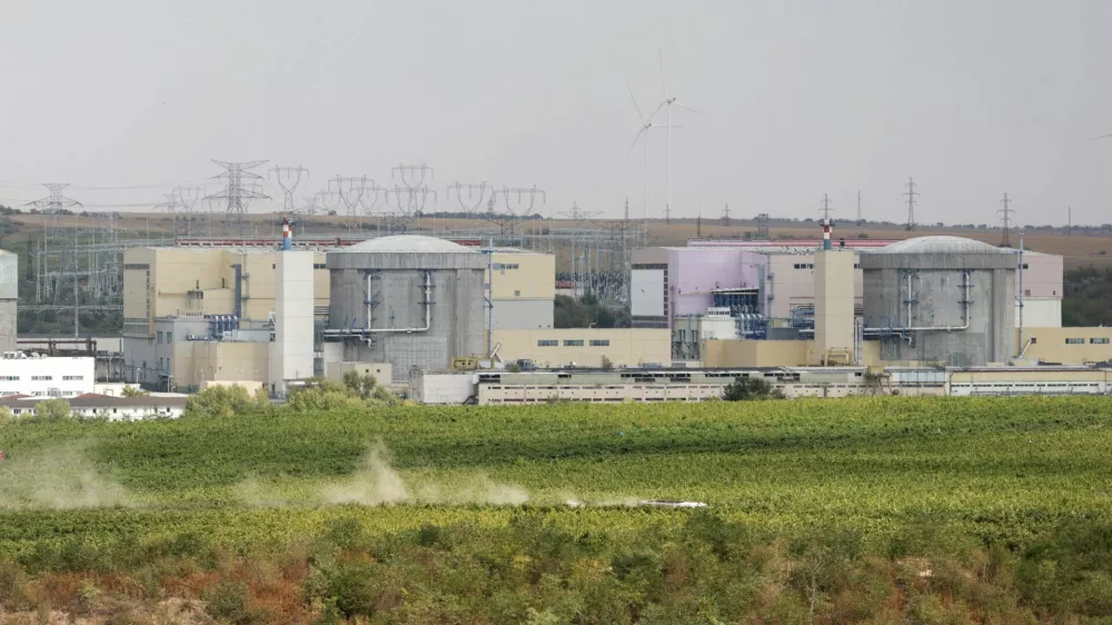 FILE PHOTO: View of the first and second nuclear reactors of state-owned nuclear power producer Nuclearelectrica, in Cernavoda, Constanta, Romania September 3, 2025. Inquam Photos/George Calin via REUTERS ATTENTION EDITORS - THIS IMAGE WAS PROVIDED BY A THIRD PARTY. ROMANIA OUT. NO COMMERCIAL OR EDITORIAL SALES IN ROMANIA//File Photo