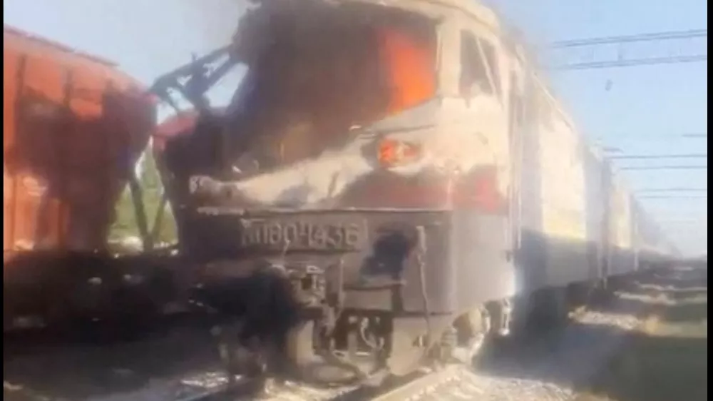 Smoke rises from a train on fire after a reported Russian drone attack, amid Russia's attack on Ukraine, in Buialyk, Odesa region, Ukraine, August 13, 2026 in this screengrab taken from a handout video. ZELENSKIY VIA TELEGRAM/Handout via REUTERS  THIS IMAGE HAS BEEN SUPPLIED BY A THIRD PARTY.