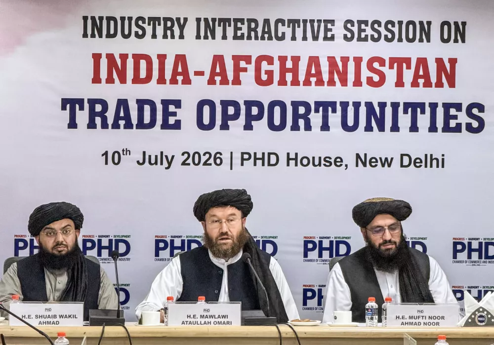 New Delhi, Jul 10 (ANI): Afghan Agriculture, Irrigation, and Livestock Minister Mawlawi Attaullah Omari, along with Afghan Embassy's Charg&eacute; d'Affaires Mufti Noor Ahmad Noor, speaks at the Industry Interactive Session on India&ndash;Afghanistan Trade Opportunities at PHD House, in New Delhi on Friday. (ANI Photo/Amit)No Use India.