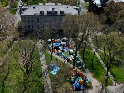 FILE PHOTO: A drone view shows an encampment at Harvard University where students protest in support of Palestinians, during the ongoing conflict between Israel and the Palestinian Islamist group Hamas, in Cambridge, Massachusetts, U.S., April 25, 2024. REUTERS/Brian Snyder/File Photo