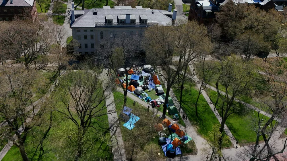 FILE PHOTO: A drone view shows an encampment at Harvard University where students protest in support of Palestinians, during the ongoing conflict between Israel and the Palestinian Islamist group Hamas, in Cambridge, Massachusetts, U.S., April 25, 2024. REUTERS/Brian Snyder/File Photo
