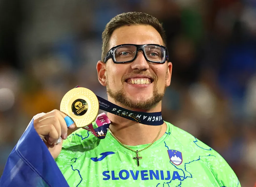 Athletics - European Athletics Championships - Alexander Stadium, Birmingham, Britain - August 13, 2026 Gold medallist Slovenia's Kristjan Ceh celebrates winning the Men's Discus Throw Final REUTERS/Hannah Mckay