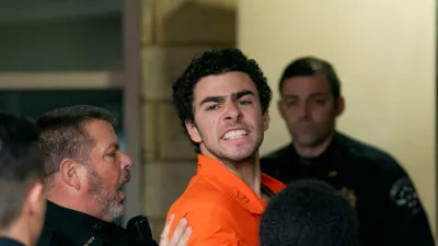 FILE - Suspect Luigi Mangione is taken into the Blair County Courthouse on Tuesday, Dec. 10, 2024, in Hollidaysburg, Pa. (Benjamin B. Braun/Pittsburgh Post-Gazette via AP, File)