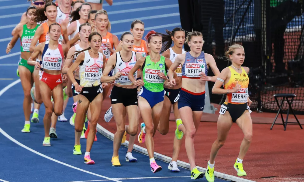 Lisa Merkel of Germany, Megan Keith of Britain, Klara Lukan of Slovenia and Nadia Battocletti of Italy lead the women's 10,000 meters final at the European Athletics Championships in Birmingham, England, Friday, Aug. 14, 2026. (AP Photo/Morgan Harlow)