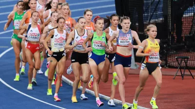 Lisa Merkel of Germany, Megan Keith of Britain, Klara Lukan of Slovenia and Nadia Battocletti of Italy lead the women's 10,000 meters final at the European Athletics Championships in Birmingham, England, Friday, Aug. 14, 2026. (AP Photo/Morgan Harlow)