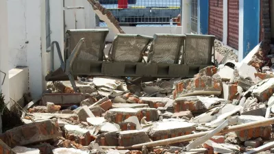 A bench sits among rubble at a heavily-damaged building at L. Say port following an earthquake in Maumere, Sikka, East Nusa Tenggara province, Indonesia, August 15, 2026. REUTERS/Stringer