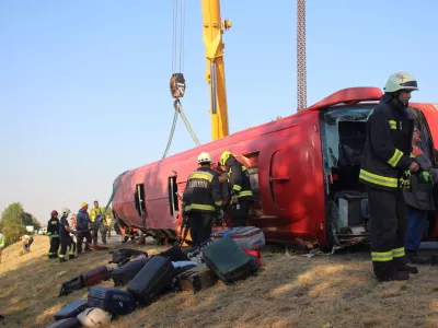 Firefighters work at the scene of a deadly accident, where a Polish bus carrying tourists veered off the motorway and overturned, near Mezokeresztes, Hungary, in this handout image released on August 16, 2026. Balazs Toth/Mezokovesd Kepekben/Handout via REUTERS THIS IMAGE HAS BEEN SUPPLIED BY A THIRD PARTY. FOR EDITORIAL USE ONLY. NO RESALES. NO ARCHIVES. MANDATORY CREDIT