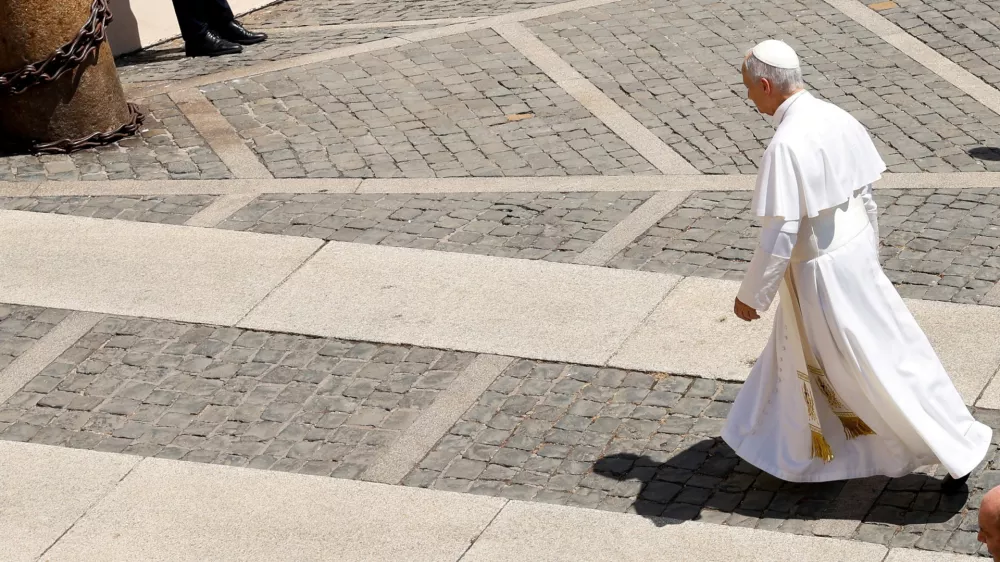 Pope Leo walks following the Angelus prayer in Piazza della Liberta in Castel Gandolfo, near Rome, Italy, August 16, 2026. REUTERS/Remo Casilli