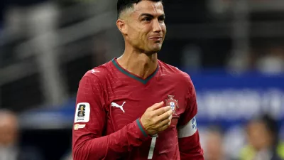 Soccer Football - FIFA World Cup 2026 - Round of 16 - Portugal v Spain - Dallas Stadium, Arlington, Texas, U.S. - July 6, 2026 Portugal's Cristiano Ronaldo looks dejected after the match as Portugal are eliminated from the World Cup IMAGN IMAGES via Reuters/Jerome Miron
