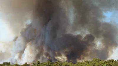 Smoke from a wildfire rises in Zadar, Croatia, August 14, 2026, in this screen grab obtained from a social media video. DOMINIK BRKLJACA/via REUTERS THIS IMAGE HAS BEEN SUPPLIED BY A THIRD PARTY. MANDATORY CREDIT. NO RESALES. NO ARCHIVES. Verification: -Buildings, terrain and roads that matched the archive and satellite imagery of the area -Coordinates: 44.162936, 15.227675 -Original file metadata -Croatian Fire Service reports of the fire