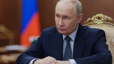 Russian President Vladimir Putin listens to the Governor of Nenets Autonomous Area Irina Gekht during their meeting at the Kremlin in Moscow, Monday, Aug. 17, 2026. (Mikhail Metzel, Sputnik, Kremlin Pool Photo via AP)