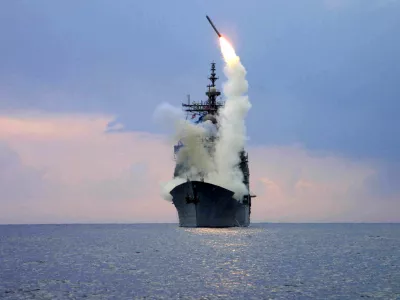 FILE PHOTO: A Tomahawk Land Attack Missile (TLAM) is launched from the guided missile cruiser USS Cape St. George, arch 23, 2003.  REUTERS/U.S. Navy/Intelligence Specialist 1st Class Kenneth Moll/File Photo/File Photo
