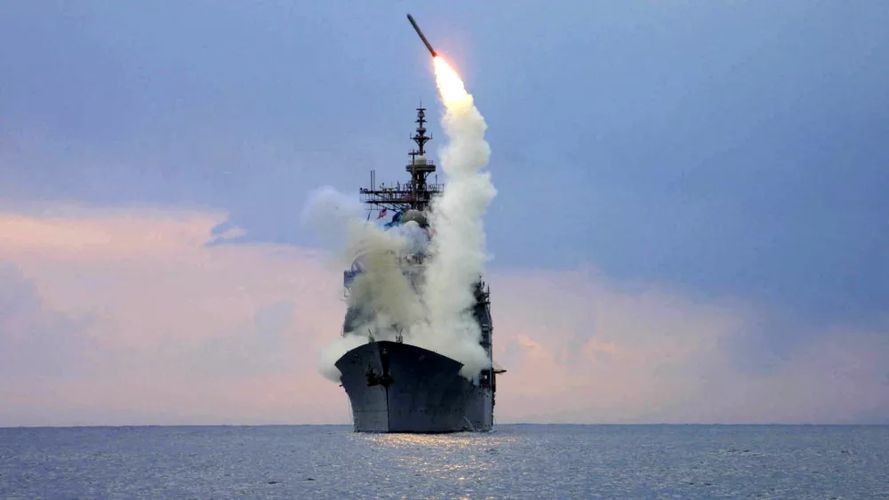 FILE PHOTO: A Tomahawk Land Attack Missile (TLAM) is launched from the guided missile cruiser USS Cape St. George, arch 23, 2003.  REUTERS/U.S. Navy/Intelligence Specialist 1st Class Kenneth Moll/File Photo/File Photo