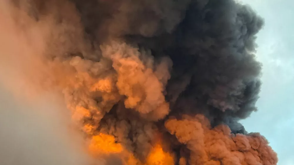 Smoke billows from the burning Wildberries warehouses following a Ukrainian drone attack, according to the regional governor, in the course of the Russia-Ukraine conflict, in Koledino, Moscow Region, Russia August 16, 2026. Picture taken with mobile phone. REUTERS/Stringer
