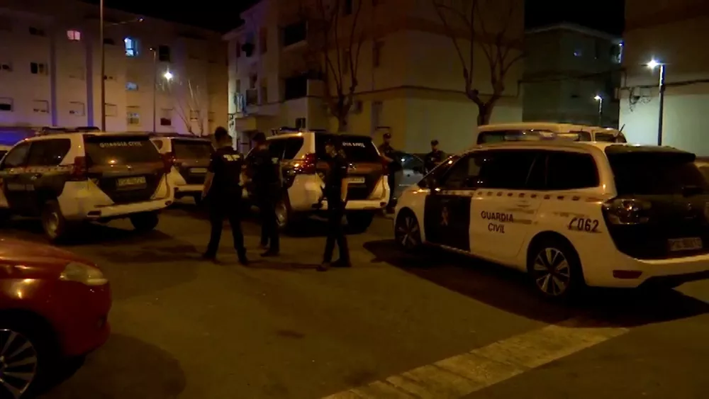 Police officers work at the crime scene where a suspected gang leader's mother-in-law, his pregnant sister and a teenager were killed in a drug-related shooting in Isla Cristina, Spain August 16, 2026. FORTA/Handout via REUTERS THIS IMAGE HAS BEEN SUPPLIED BY A THIRD PARTY. SPAIN OUT. NO COMMERCIAL OR EDITORIAL SALES IN SPAIN.