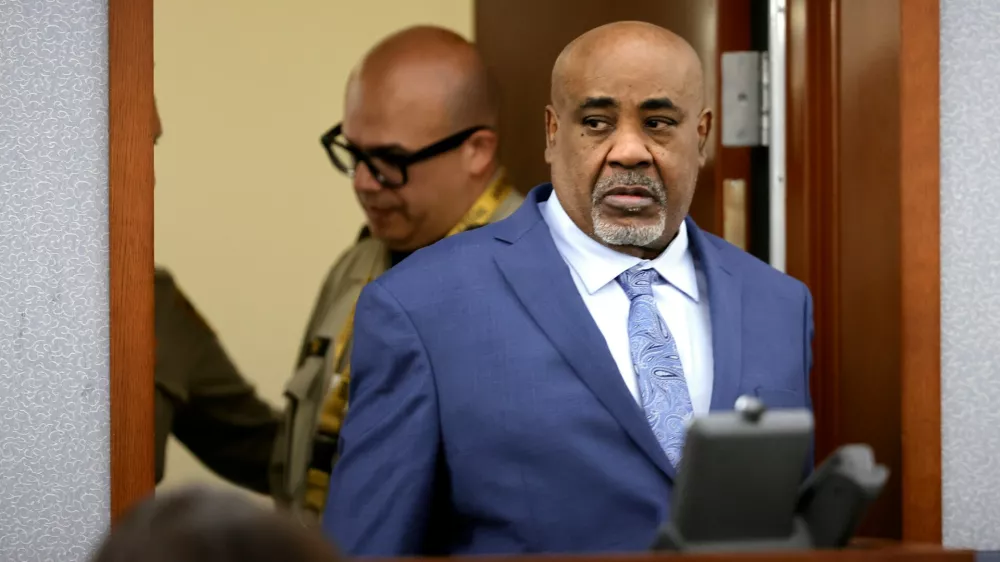 Duane Davis arrives in the courtroom for his murder trial, related to the 1996 killing of rapper Tupac Shakur, at Clark County District Court Regional Justice Center in Las Vegas, Monday, Aug. 17, 2026. (Steve Marcus/Pool Photo via AP)