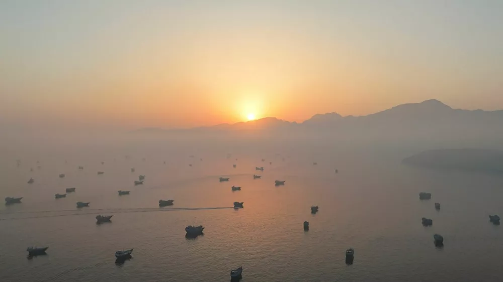 FILE PHOTO: A drone view shows vessels in the Strait of Hormuz, as seen from Musandam, Oman, June 15, 2026. REUTERS/Stringer/File Photo