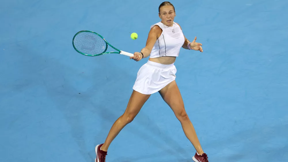 MASON, OHIO - AUGUST 17: Amanda Anisimova of the United States returns a shot during a match against Alexandra Eala of the Philippines on day seven of the Cincinnati Open at Lindner Family Tennis Center on August 17, 2026 in Mason, Ohio. Emilee Chinn,Image: 1124940707, License: Rights-managed, Restrictions:, Model Release: no 