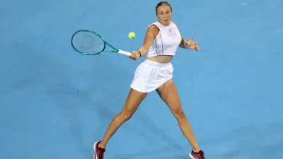 MASON, OHIO - AUGUST 17: Amanda Anisimova of the United States returns a shot during a match against Alexandra Eala of the Philippines on day seven of the Cincinnati Open at Lindner Family Tennis Center on August 17, 2026 in Mason, Ohio. Emilee Chinn,Image: 1124940707, License: Rights-managed, Restrictions:, Model Release: no 