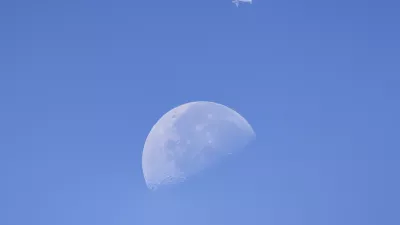 A commercial aircraft passes in front of the Moon above Sofia, Bulgaria, on August 5, 2026. The photograph was taken as astronomers and skywatchers observed the widely anticipated impact of a SpaceX Falcon 9 upper stage with the lunar surface during a closely followed space event.