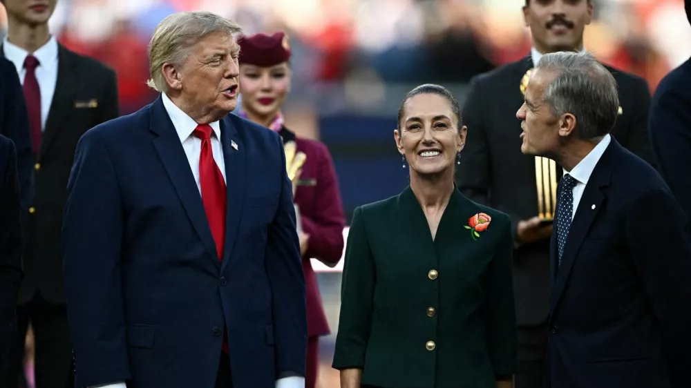 FILE PHOTO: Soccer Football - FIFA World Cup 2026 - Final - Spain v Argentina - New York/New Jersey Stadium, East Rutherford, New Jersey, U.S. - July 19, 2026 U.S. President Donald Trump, Mexican President Claudia Sheinbaum and Canada's Prime Minister Mark Carney during the trophy presentation after the match REUTERS/Dylan Martinez/File Photo