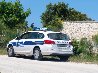 Labin,Croatia, 2023: Police car (Policija) on a country road near Labin