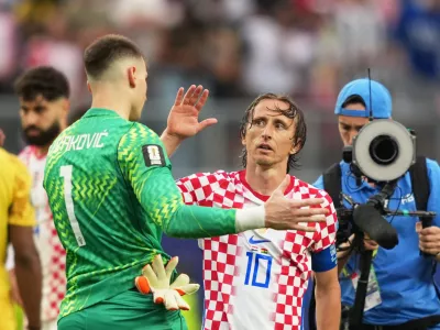 Soccer Football - FIFA World Cup 2026 - Group L - Croatia v Ghana - Philadelphia Stadium, Philadelphia, Pennsylvania, U.S. - June 27, 2026 Croatia's Luka Modric and Dominik Livakovic celebrate after the match IMAGN IMAGES via Reuters/James Lang