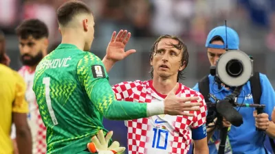 Soccer Football - FIFA World Cup 2026 - Group L - Croatia v Ghana - Philadelphia Stadium, Philadelphia, Pennsylvania, U.S. - June 27, 2026 Croatia's Luka Modric and Dominik Livakovic celebrate after the match IMAGN IMAGES via Reuters/James Lang