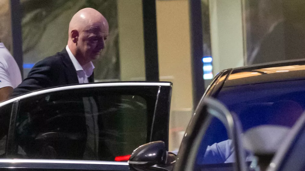 FIFA president Gianni Infantino leaves after attending a Women AFCON 2026 soccer match between Malawi and Zambia, in Rabat, Morocco, Wednesday, Aug. 5, 2026. (AP Photo)