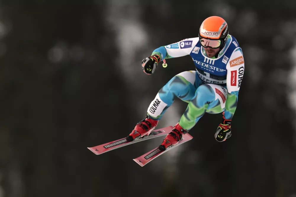 Slovenia's Miha Hrobat speeds down the course, during an alpine ski, men's downhill race, at the Lillehammer World Cup Finals, in Kvitfjell, Norway, Saturday, March 21, 2026. (AP Photo/Gabriele Facciotti)