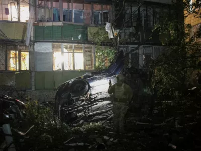 A police officer inspects a site of an apartment building hit by a Russian missile strike, amid Russia's attack on Ukraine, in Kyiv, Ukraine August 20, 2026. REUTERS/Anatolii Stepanov