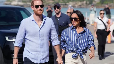 FILE - Prince Harry, and Meghan, the Duke and Duchess of Sussex, arrive for an event, during a visit to Bondi Beach, Australia, April 17, 2026. (Jonathan Brady/Pool Photo via AP, File)
