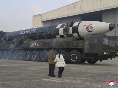 This photo provided on Nov. 19, 2022, by the North Korean government shows North Korean leader Kim Jong Un, left, and his daughter inspect what it says a Hwasong-17 intercontinental ballistic missile at Pyongyang International Airport in Pyongyang, North Korea, Friday, Nov. 18, 2022. Independent journalists were not given access to cover the event depicted in this image distributed by the North Korean government. The content of this image is as provided and cannot be independently verified. Korean language watermark on image as provided by source reads: "KCNA" which is the abbreviation for Korean Central News Agency. (Korean Central News Agency/Korea News Service via AP)