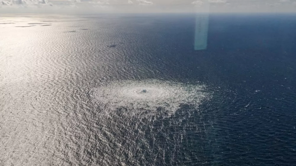 FILE PHOTO: Gas leak at Nord Stream 2 as seen from the Danish F-16 interceptor on Bornholm, Denmark September 27, 2022. Danish Defence Command/Forsvaret Ritzau Scanpix/via REUTERS  ATTENTION EDITORS - THIS IMAGE WAS PROVIDED BY A THIRD PARTY. DENMARK OUT. NO COMMERCIAL OR EDITORIAL SALES IN DENMARK./File Photo