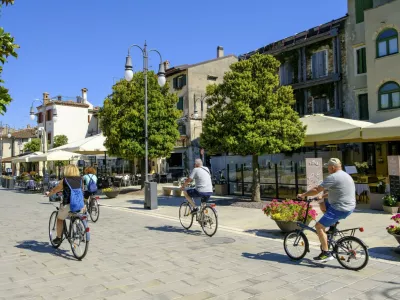 Cyclist, old town centre, Grado, Julian Friuli, Adriatic Sea, Italy,Image: 1035968141, License: Rights-managed, Restrictions:, Model Release: no 