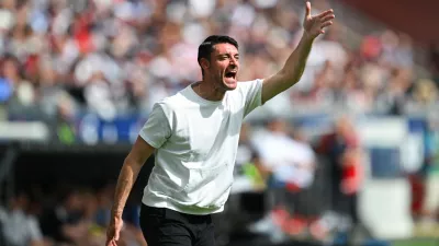 Eintracht Frankfurt's coach Albert Riera reacts on the touchline during a German Bundesliga soccer match between Eintracht Frankfurt and Hamburger SV in Frankfurt, Germany, Saturday, May 2, 2026. (Florian Wiegand/dpa via AP)