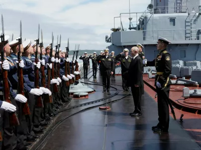 Russian President Vladimir Putin is welcomed on board a missile cruiser "Varyag" as he observes a military drill of Pacific fleet, in Russia's far eastern Sakhalin Region, Russia, August 12, 2026. Sputnik/Gavriil Grigorov/Pool via REUTERS ATTENTION EDITORS - THIS IMAGE WAS PROVIDED BY A THIRD PARTY.   TPX IMAGES OF THE DAY