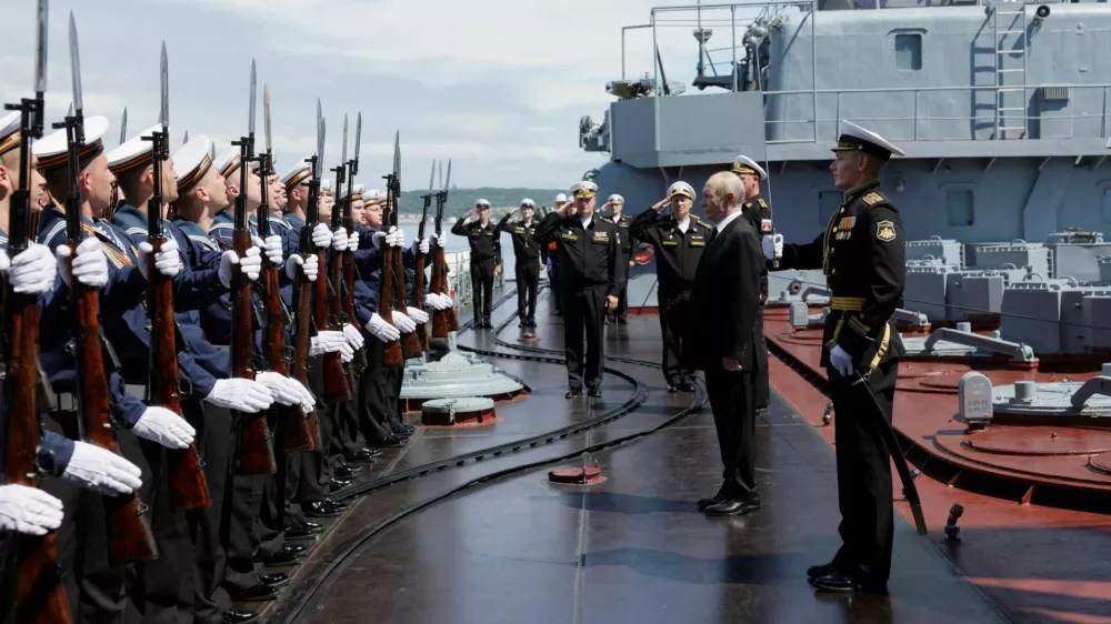 Russian President Vladimir Putin is welcomed on board a missile cruiser "Varyag" as he observes a military drill of Pacific fleet, in Russia's far eastern Sakhalin Region, Russia, August 12, 2026. Sputnik/Gavriil Grigorov/Pool via REUTERS ATTENTION EDITORS - THIS IMAGE WAS PROVIDED BY A THIRD PARTY.   TPX IMAGES OF THE DAY