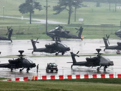 U.S. Army AH-64 Apache attack helicopters are parked at Camp Humphreys, on the final day of the annual U.S.-South Korea Ulchi Freedom Shield (UFS) joint military exercise, which was shortened by six days after U.S. President Donald Trump ordered a substantial reduction in U.S. participation, in Pyeongtaek, South Korea, August 21, 2026.  Yonhap via REUTERS ATTENTION EDITORS - THIS IMAGE HAS BEEN SUPPLIED BY A THIRD PARTY. NO RESALES. NO ARCHIVE. SOUTH KOREA OUT. NO COMMERCIAL OR EDITORIAL SALES IN SOUTH KOREA.