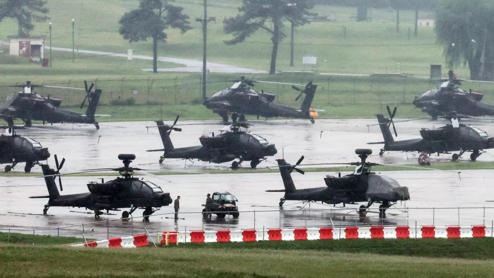 U.S. Army AH-64 Apache attack helicopters are parked at Camp Humphreys, on the final day of the annual U.S.-South Korea Ulchi Freedom Shield (UFS) joint military exercise, which was shortened by six days after U.S. President Donald Trump ordered a substantial reduction in U.S. participation, in Pyeongtaek, South Korea, August 21, 2026.  Yonhap via REUTERS ATTENTION EDITORS - THIS IMAGE HAS BEEN SUPPLIED BY A THIRD PARTY. NO RESALES. NO ARCHIVE. SOUTH KOREA OUT. NO COMMERCIAL OR EDITORIAL SALES IN SOUTH KOREA.