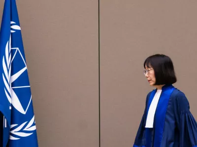 FILE - Judge Tomoko Akane walks before delivering the verdict in the Al Hassan case at the International Criminal Court in The Hague, Netherlands, Wednesday Nov. 20, 2024. (Eva Plevier/Pool Photo via AP, file)