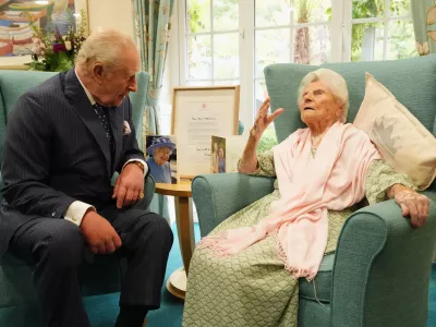 FILE - Britain's King Charles III meets the world's oldest person, 116-year-old Ethel Caterham, in Lightwater, England, Sept. 20, 2025. Ms Caterham is celebrating her 117th birthday on Friday Aug. 21, 2026. (Jonathan Brady/PA via AP, File)