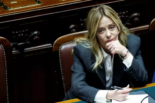 FILE PHOTO: Italy's Prime Minister Giorgia Meloni listens to debate, after she reported on her government's actions and is expected to speak on the latest developments in Iran, at the lower house of Parliament in Rome, Italy, April 9, 2026. REUTERS/Remo Casilli/File Photo