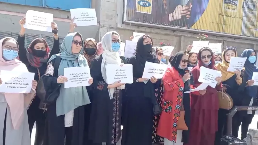 Women hold placards as they protest in Kabul, Afghanistan September 3, 2021 in this still image obtained from a social media video. Facebook @WPPN.AFG/via REUTERS THIS IMAGE HAS BEEN SUPPLIED BY A THIRD PARTY. MANDATORY CREDIT. NO RESALES. NO ARCHIVES.
