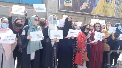 Women hold placards as they protest in Kabul, Afghanistan September 3, 2021 in this still image obtained from a social media video. Facebook @WPPN.AFG/via REUTERS THIS IMAGE HAS BEEN SUPPLIED BY A THIRD PARTY. MANDATORY CREDIT. NO RESALES. NO ARCHIVES.
