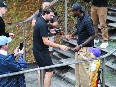 Luka Doncic signing a jersey of a young fanLos Angeles Lakers star Luka Doncic takes his teammates on a sightseeing boat tour of Ljubljana during the team's visit to the Slovenian capital. Doncic is hosting his Lakers teammates in his hometown as part of a four-day team gathering ahead of the new NBA season. The group toured the city by boat, taking in Ljubljana's historic city centre and landmarks along the Ljubljanica River.