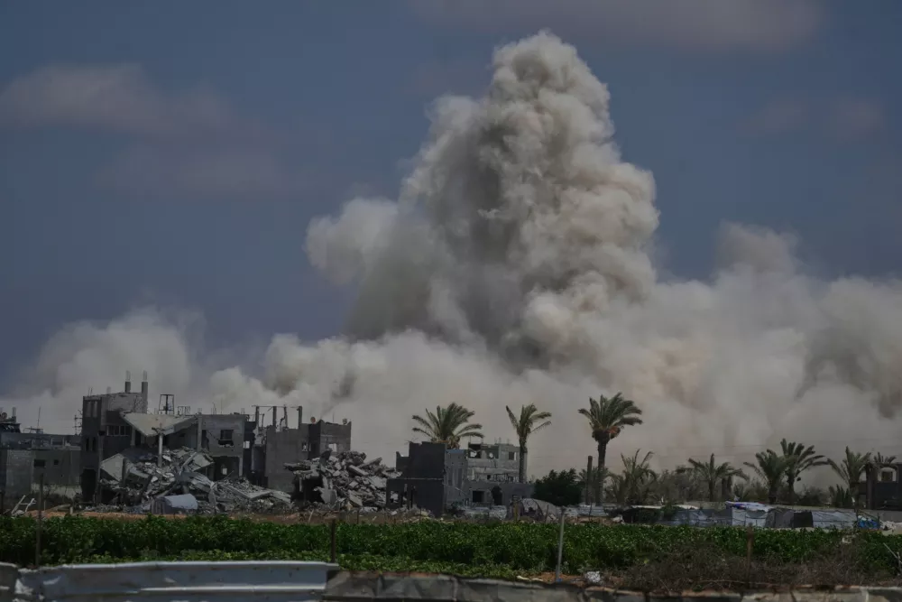 The Israeli army demolishes buildings east of Deir al-Balah, central Gaza Strip, Saturday Aug. 22, 2026. (AP Photo/Abdel Kareem Hana)